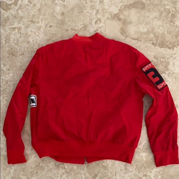 Red jacket with signs. Size L (runs small like M) - Picture 2 of 4